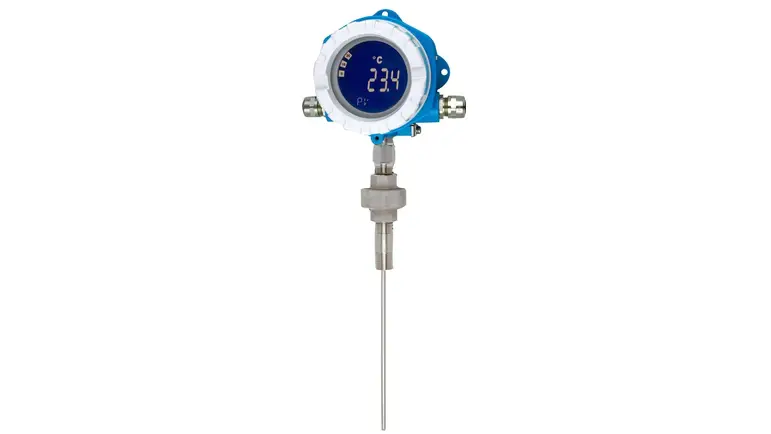 A blue and white thermometer with a long metal probe, sitting on a white surface. The temperature reading is 23.4 degrees Celsius.